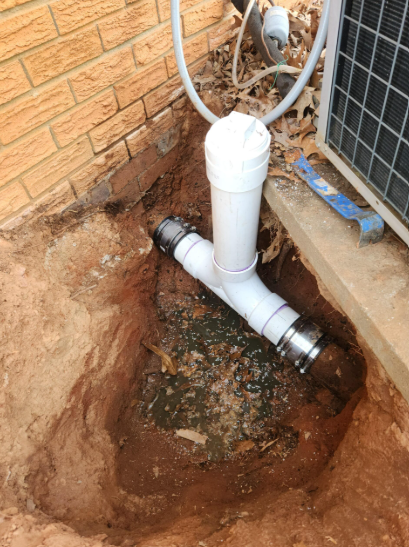 Waste pipework under a kitchen sink